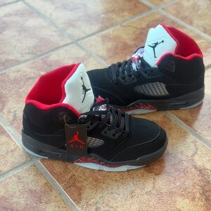 Size 9.5 Men’s And Women’s 11 - Jordan Black and Red Mid-Top Basketball Sneakers